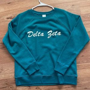 NEOT size medium time and tru delta zeta pullover